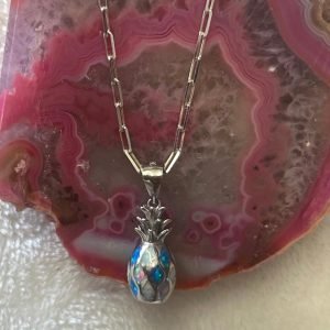 Sterling silver chain and pineapple-opal pendant.
