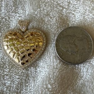 Solid 10 k gold Heart-nugget pendant.