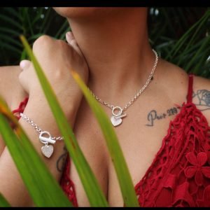 Sterling silver heart hand chain and necklace set.