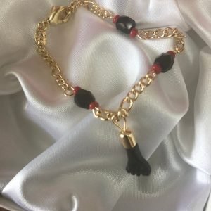 Gold plated black hand baby bracelet.