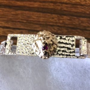 925 Sterling silver with gold lion head bracelet.