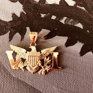 Solid 10k gold VI Eagle pendant .