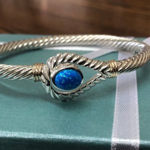 14 k gold wrapped and 925 sterling silver opal bracelet .